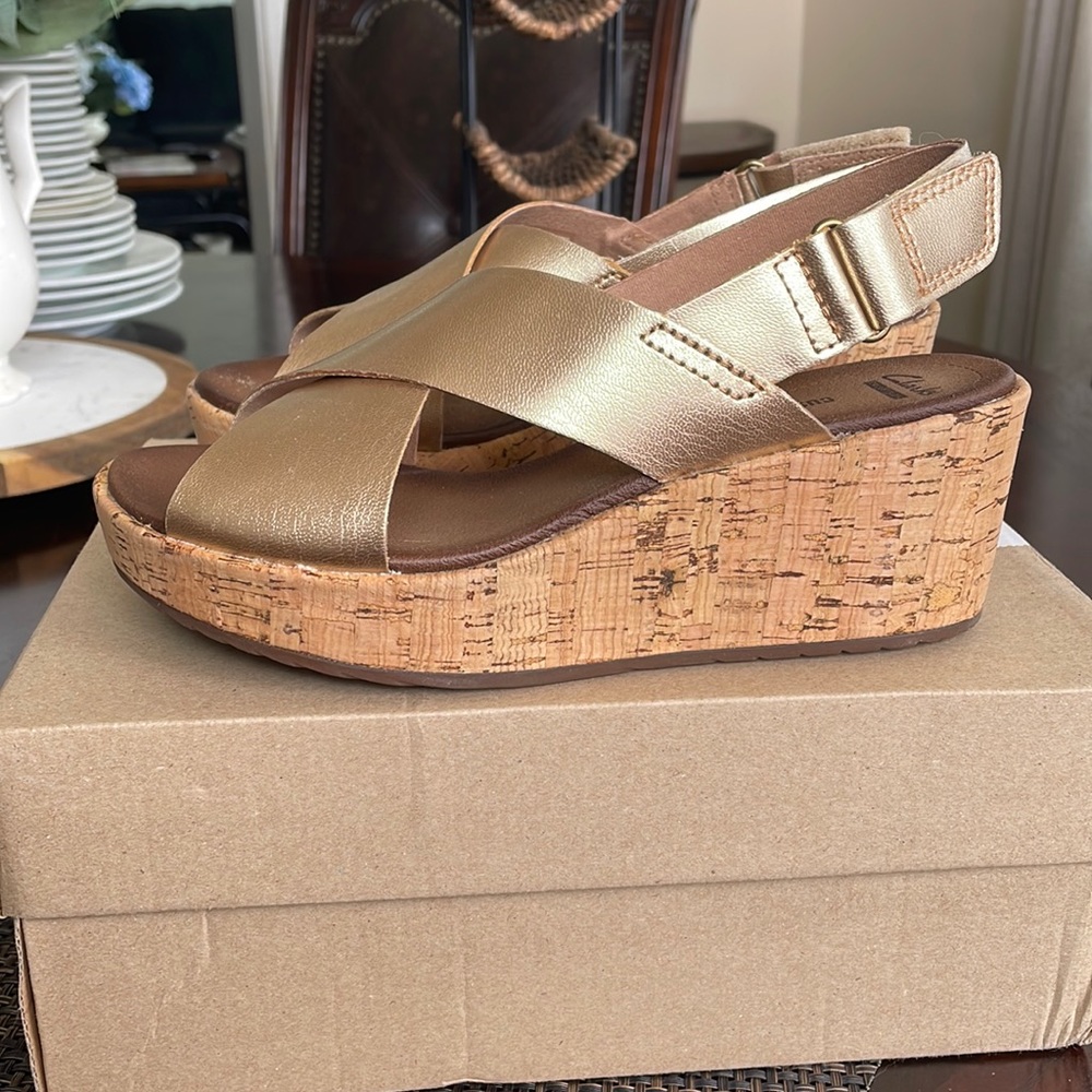New wedges Clark’s  gold color size 7